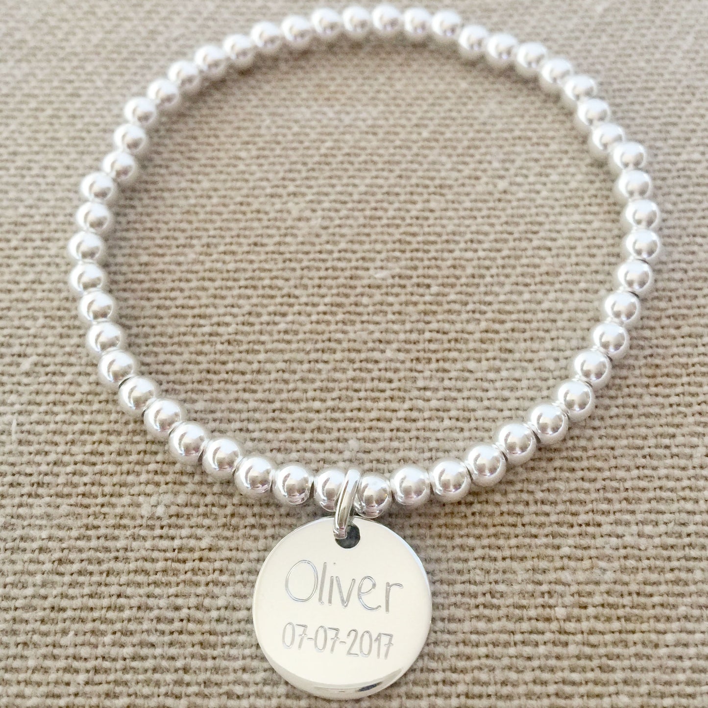 Pulsera Personalizada de Plata con Datos de Nacimiento_delante