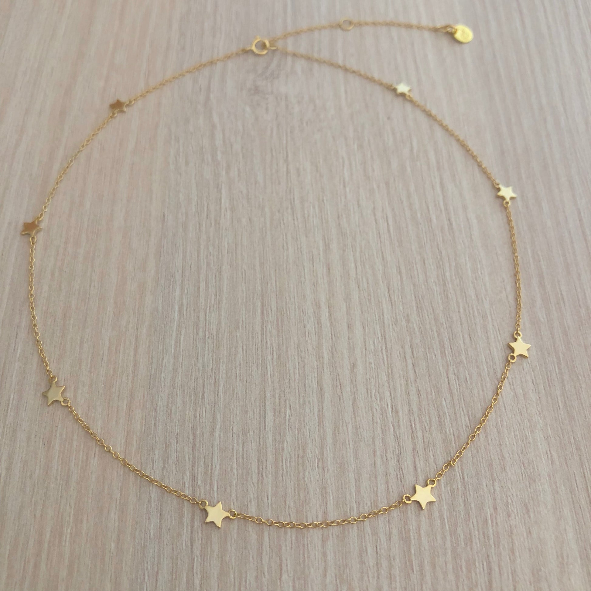 Collar con Estrellas Intercaladas de Plata con baño de Oro
