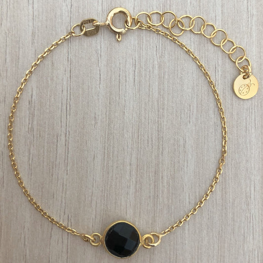 Pulsera de Plata con Baño de Oro y Piedra Semipreciosa Negra