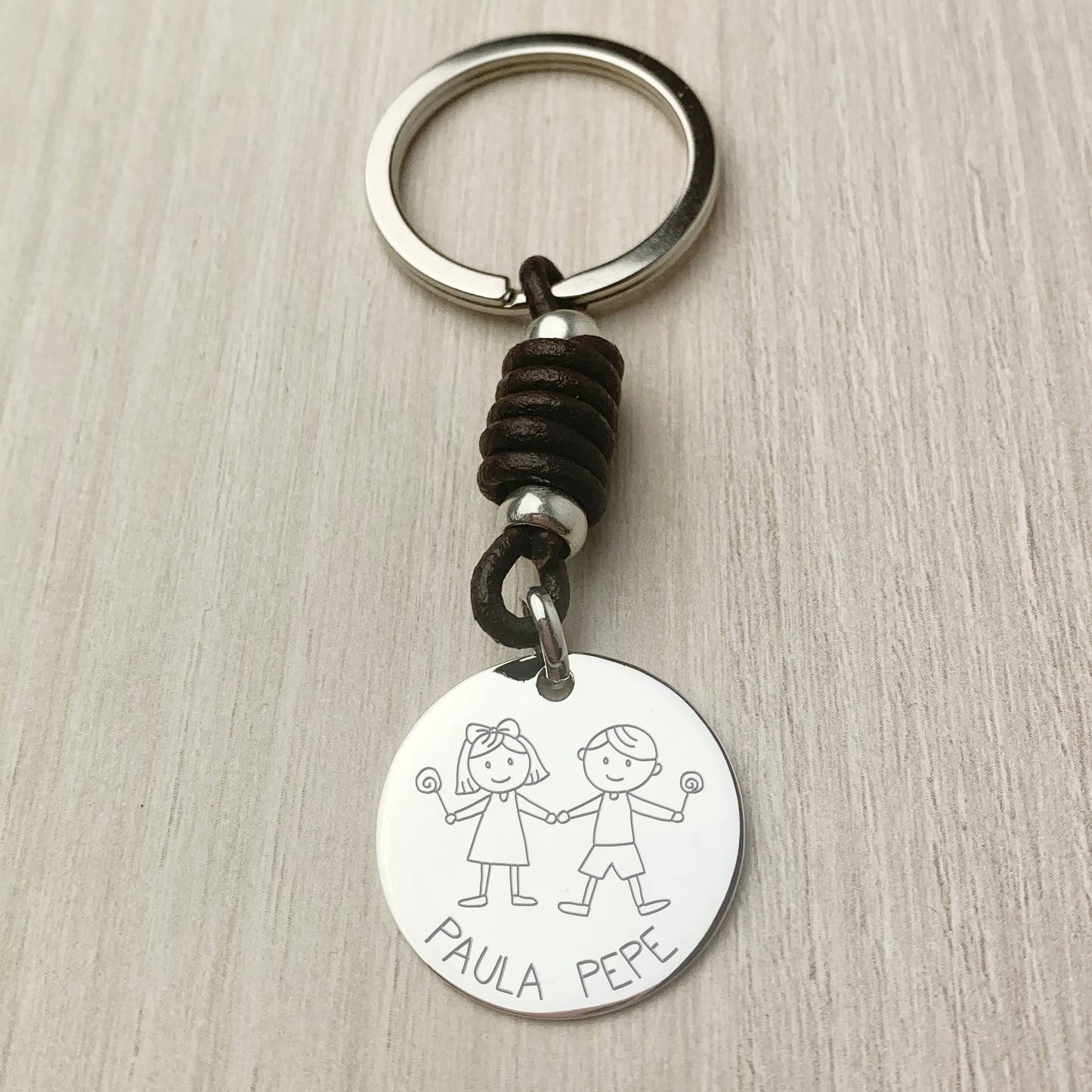 Llavero Personalizado de Plata y Cuero con grabado libre